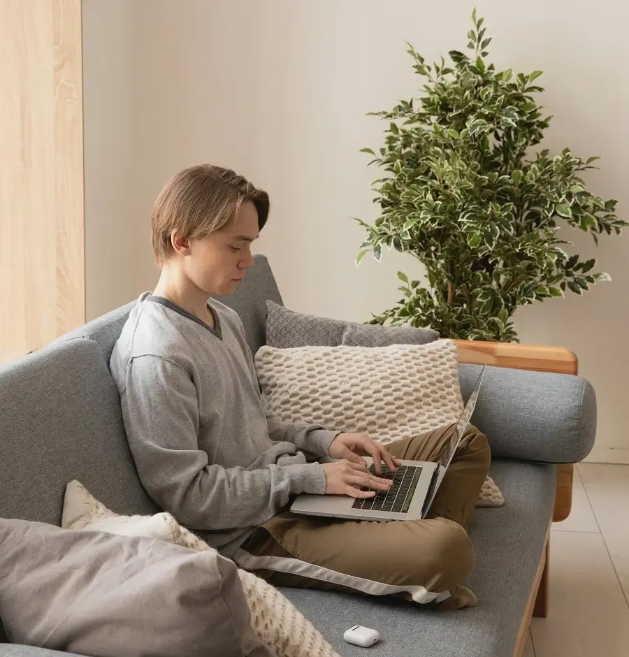 Professional using laptop for development work